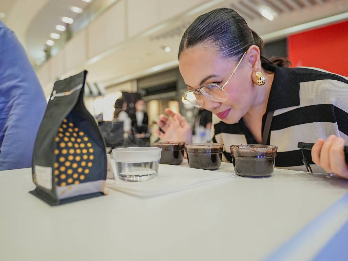 A participant delights in learning about the delicate nuances of coffee at the Coffee Cupping sessions hosted by Deuces Coffee at Café Aromatique.